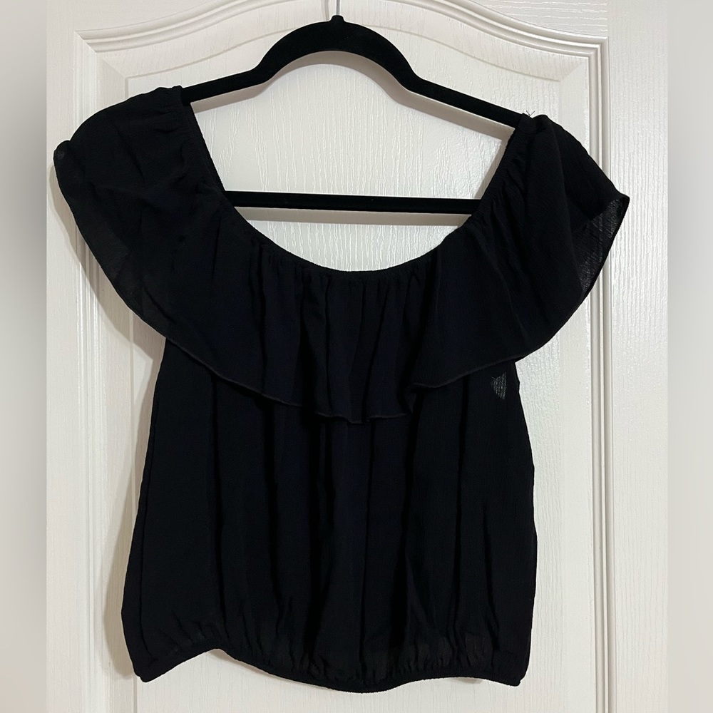 Black top. Off/On shoulder.